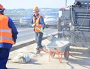 Стало известно, когда начнут асфальтировать мост через Волгу