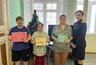 Миниатюра новости: Сотрудники СК России поздравили постояльцев геронтологического центра с Новым годом